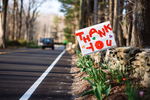 Gott sei Dank - die Grenze ist weg ("Thank you" Schild neben Straßenrand)